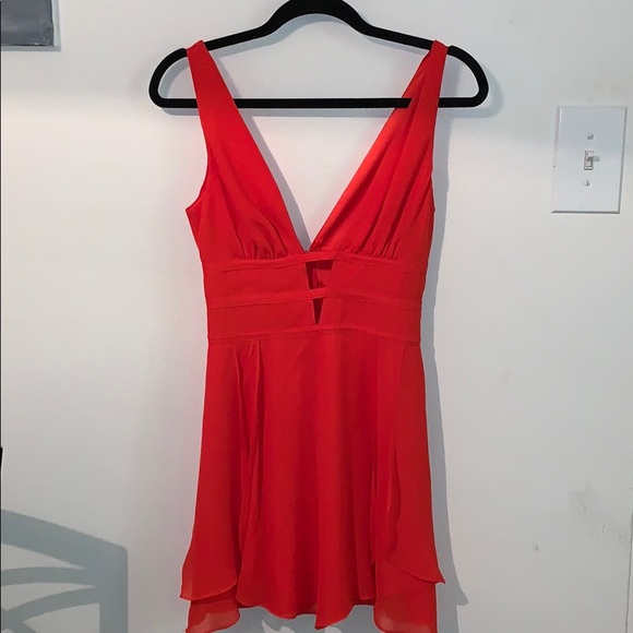 bebe Dresses & Skirts - Flowy & fun BEBE dress.